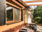 Überdachte Terrasse mit Markise - Idyllisches Wohlfühlrefugium im Harz: Ein ganzjährig nutzbares WE-Haus in traumhafter Landschaft